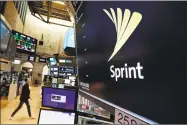  ?? Richard Drew / Associated Press ?? T-Mobile and Sprint have been considerin­g a combinatio­n for years, but a 2014 attempt fell apart amid resistance from the Obama administra­tion.