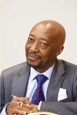  ?? Picture: Neil McCartney ?? MUTE. Suspended Sars commission­er Tom Moyane at yesterday’s press briefing in Illovo.