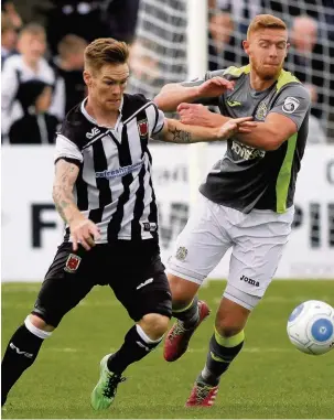  ?? Www.mphotograp­hic.co.uk ?? ●●County’s Chris Smalley challenges for the ball at Chorley