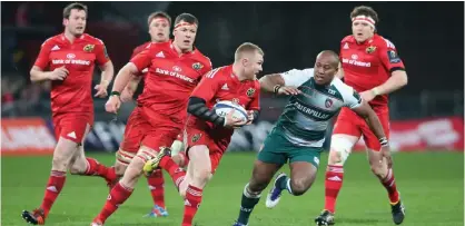  ??  ?? File photo shows Keith Earls of Munster takes on Seremaia Bai during a match. Munster will play its first rugby game since the sudden death of coach Anthony Foley.