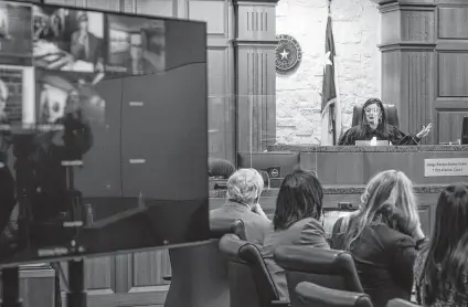  ?? Photos by Mark Mulligan / Staff photograph­er ?? State District Judge Rabeea Collier addresses a hearing in which she said several of Deshaun Watson’s accusers must identify themselves.