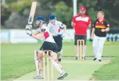  ??  ?? Ocean Grove's Jacquie Johnston hits out against St Joseph’s on Sunday.