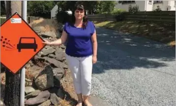  ??  ?? Cllr Nicola Lawless at the newly resurfaced road.