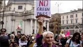  ?? ?? A protester holds a placard during a protest against the mandatory ‘green pass’ in the aim to limit the spread of the Covid-19, in Rome