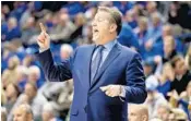  ?? ANDY LYONS/GETTY IMAGES ?? John Calipari and his Wildcats will play West Virginia with the hopes of starting their climb back into the Top 25. FRESHMAN