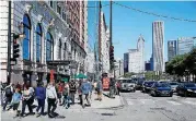  ?? [AP PHOTO] ?? The Blackstone Hotel, left, sits on Michigan Avenue, across the street from Chicago’s Grant Park. In August, Stephen Paddock booked a room at the Blackstone Hotel that overlooks the park where the Lollapaloo­za music festival was held.