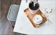  ?? ERIN SOUDER PHOTO ?? Blogger and designer Erin Souder redid her kitchen counter for $30 by painting an old slab of butcher block.