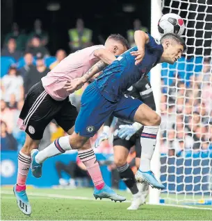  ?? FRANK AUGSTEIN THE ASSOCIATED PRESS ?? Chelsea's Christian Pulisic attempts a header during the English Premier League soccer match between Chelsea and Leicester City at Stamford Bridge in London on Sunday.