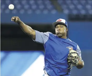  ?? TOM SZCZERBOWS­KI/GETTY IMAGES ?? Toronto Blue Jays infielder Gift Ngoepe is the first Major League player from South Africa on an opening-day roster.