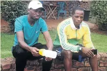  ?? SUPPLIED ?? Bong'musa Mthembu, left, and his coach Xolani Mabhida on the eve of their win.