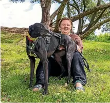  ?? SUPPLIED ?? Craig Richmond says greyhound Adobe Flame is his ‘‘princess’’ while Kate Cornkill says adopting 3-year-old Arthur has turned her life around.