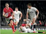  ?? GETTY IMAGES ?? Wales wing George North breaks away from Henry Slade in the Six Nations clash in London earlier this month.