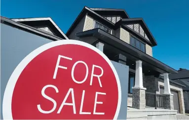  ?? SEAN KILPATRICK/THE CANADIAN PRESS FILE PHOTO ?? The number of Ontario real-estate transactio­ns involving foreign entities has been dropping since the tax was introduced.