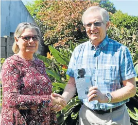  ?? Picture: JON HOUZET ?? GREAT PRIZE: Tiso Blackstar Community Newspapers business manager Mauneen Charter handed Tony Mitchell his prize, a Go-Pro Hero 5 Session sponsored by Orms