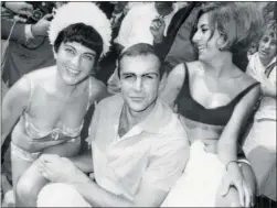  ?? AFP/Getty Images ?? Actor Sean Connery, is seen in Cannes in this 1960s photo, when he played
James Bond. The film franchise celebrates its 50th anniversar­y today.