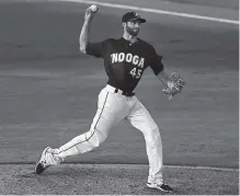  ?? STAFF PHOTO BY C.B. SCHMELTER ?? The Chattanoog­a Lookouts’ Randy LeBlanc pitches against the Tennessee Smokies in the top of the fifth inning at AT&T Field on Friday.