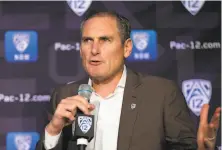  ?? D. Ross Cameron / Associated Press 2019 ?? Pac12 Commission­er Larry Scott said teams in Oregon and California are exploring what is required to restart practices.