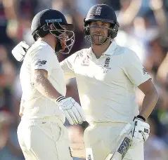  ??  ?? Well done: Jonny Bairstow congratula­tes Malan on his ton