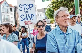  ?? Gabrielle Lurie/The Chronicle ?? Residents protest city plans in 2023 to move 200 boat slips to a spot in front of Marina Green so an area polluted by an old power plant could be cleaned up.