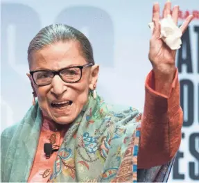  ?? CLIFF OWEN/AP ?? Supreme Court Associate Justice Ruth Bader Ginsburg waves to the audience after speaking at the Library of Congress National Book Festival in Washington, D.C., in late August.