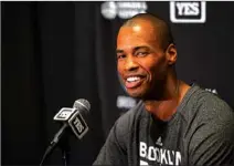  ??  ?? Brooklyn Nets center Jason Collins speaks during a news conference Sunday in Los Angeles. Collins is the NBA’s first active openly gay player.