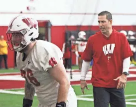  ?? JOURNAL SENTINEL FILES ?? Wisconsin coach Luke Fickell watches drills during the team’s first spring practice in March. The Badgers have worked to bolster the team’s cornerback depth and secured an oral commitment Tuesday.