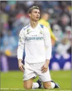  ?? GABRIEL BOUYS/AFP ?? Real Madrid’s forward Cristiano Ronaldo reacts after missing a shot during the Spanish league football match against Villarreal at the Santiago Bernabeu Stadium in Madrid on Saturday.