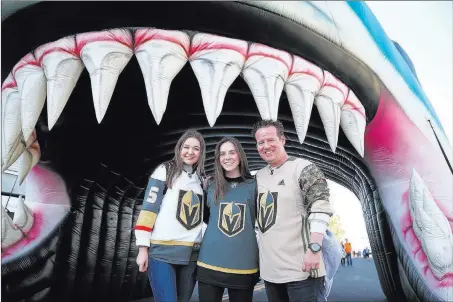  ?? Erik Verduzco ?? Las Vegas Review-journal @Erik_verduzco Keith Veltre, right, of Las Vegas, with his daughter Mckayla, 14, center, and her friend Alexis Zarley, 15, pose before Game 4 of the Golden Knights’ second-round NHL playoff series against the San Jose Sharks...