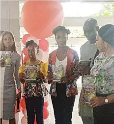  ?? ?? The representa­tive of the chief launcher, Olusanya Aderinmola; the author, Tobiloba Akapo; her parents, Bukola and Segun Akapo and Head of School Corona, Mrs. Henrietta Eguagie, at the book launch, yesterday.