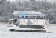  ??  ?? Dilapidate­d houseboats and sailboats moored in the Broadwater between Southport and Runaway Bay are a blight on the Coast, says one Gold Coast MP.