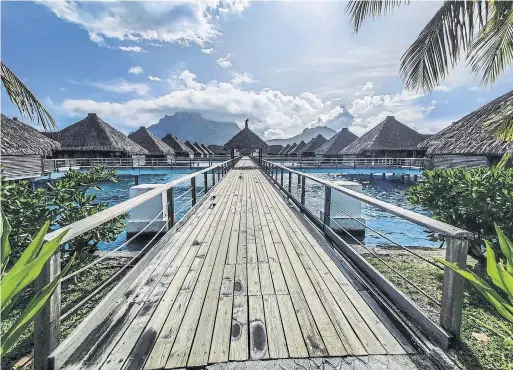  ?? RENÉE S. SUEN PHOTOS ?? Tahiti is famous for its overwater bungalows, but lesser known for its multicultu­ral cuisine.