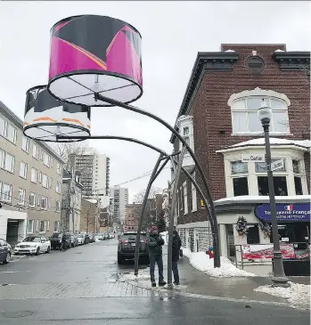  ?? PHOTOS: KIM PEMBERTON ?? Nearby the main Quebec City Biennial site, at the new Pierre Lassonde Pavilion of the Musee national des beaux-arts du Quebec, is a unique way to view some contempora­ry art from the museum’s archives — on 34 large scale street lampshades.