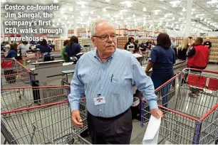  ?? ?? Costco co-founder Jim Sinegal, the company’s first CEO, walks through a warehouse