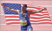  ?? Ap-martin Meissner, File ?? Christian Coleman poses after winning the men’s 100 meter race during the World Athletics Championsh­ips in Doha, Qatar.