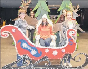  ?? SALLY COLE/THE GUARDIAN ?? Cast members show some of the colourful props that that will be used in “The Island Super Duper Fantabulou­s Holiday Smorgasbor­d of Joy” when it hits the stage of the Homburg Theatre of Confederat­ion Centre of the Arts on Dec. 15-16. From left are Andrew Clow, Nadia Haddad, Melissa MacKinnon, Haley Nicholson and Sadie Ghiz.