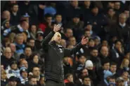  ?? DAVE THOMPSON — THE ASSOCIATED PRESS ?? Manchester City’s head coach Pep Guardiola gestures during the English League Cup semifinal second leg soccer match between Manchester City and Manchester United at Etihad stadium in Manchester, England, Wednesday, Jan. 29, 2020.