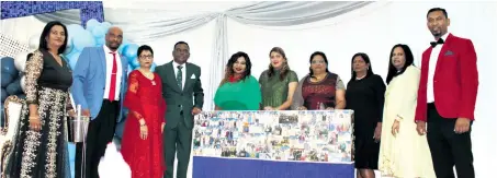  ?? ?? Bidding principal V Moodley (fourth from left) well on his retirement were staff members - J Naiken, acting principal AT Naicker, P Naicker, O Dumakude, N Chetty, P Pillay, S Ramsamy, P Padayachee, and TS Ramsamy