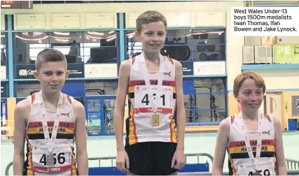  ??  ?? West Wales Under-13 boys 1500m medalists Iwan Thomas, Ifan Bowen and Jake Lynock.