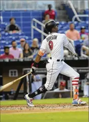  ?? ELLIS RUA / MIAMI HERALD ?? Marlins outfielder Lewis Brinson was placed on the 10-day disabled list Wednesday with a left hip injury that stemmed from a diving catch he made in Colorado more than week ago.