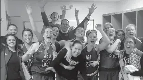  ?? Photo courtesy of John Brown University athletics ?? The John Brown women’s basketball team celebrated in the locker room Tuesday night after defeating Mid-America Christian 83-69 in the opening round of the Sooner Athletic Conference Tournament.