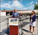  ?? Julia Bergman / Hearst Connecticu­t Media ?? Bob Stefanowsk­i stands Wednesday with Katie Childs, vice president of Tuxis-Ohr’s, a fuel and oil delivery company in Meriden, as he calls for a suspension of the state’s tax on diesel fuel.