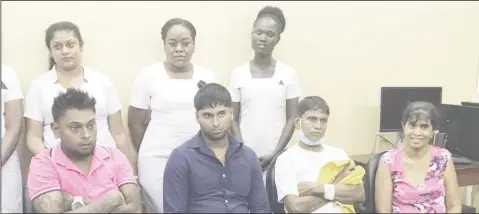  ??  ?? The recipients and donors of the successful paired kidney transplant along with the nurses. Seated from left are Ravi Narine, recipient of a kidney from Kumarie Boodhoo (extreme right), his brother Ghansham Narine, and Freddie Boodhoo, recipient of Ghansham’s kidney