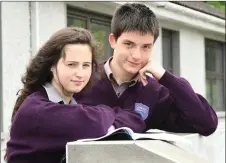  ??  ?? Coláiste Gleann Lí students Saoirse Hussey and Daniel Chung revising head of their Leaving exams last week.