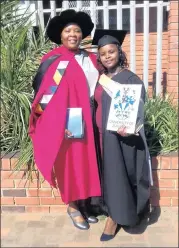  ??  ?? Phumla Mnyandu celebratin­g her graduation with Professor Mpume Zondi.