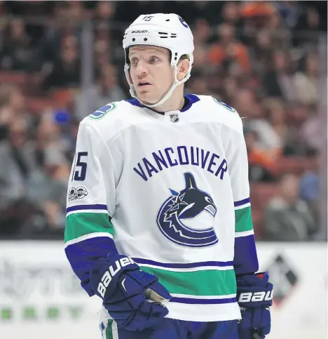  ?? HAFFEY/GETTY IMAGES ?? Derek Dorsett got off to a surprising offensive start this season, scoring seven goals after returning to the team following rehab from a cervical fusion procedure last December. He’s now back in Vancouver getting checked out after he suffered...