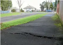  ?? TOM LEE/STUFF ?? Kids use the broken footpath as a skate ramp - sometimes it is successful other times it isn’t.