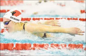  ?? Tyler Sizemore / Hearst Connecticu­t Media ?? Greenwich’s Hannah Seward finishes second in the 100meter butterfly race at the FCIAC championsh­ip last November.