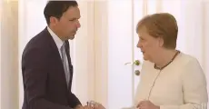  ?? (Reuters TV) ?? GERMAN CHANCELLOR Angela Merkel receives water after she was seen shaking meeting President Frank-Walter Steinmeier in Berlin last month.