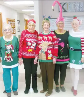  ?? Westside Eagle Observer/SUSAN HOLLAND ?? Five contestant­s who entered the judging in the annual ugliest sweater contest display their holiday attire. The contest was a part of the Christmas party at the Billy V. Hall Senior Activity and Wellness Center. Pictured are Connie Adams (left), Coleen Dickinson, Juanita Whiteside, La Vonda Augustine and Carole Robel.