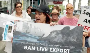  ?? GLENN JEFFREY/STUFF ?? Anneka Carlson, centre, has led several protests against the live export of cattle.